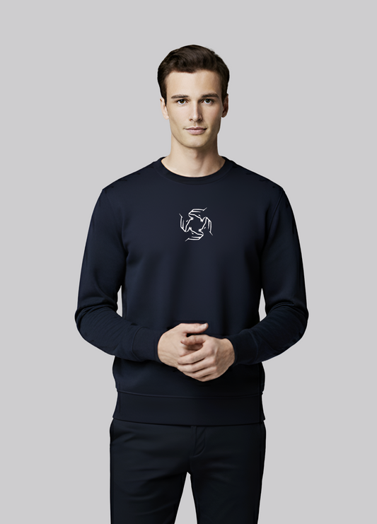 Man wearing a french navy Northwind sweatshirt with Northwind wolf storm embroidered logo on a white background, close front pose