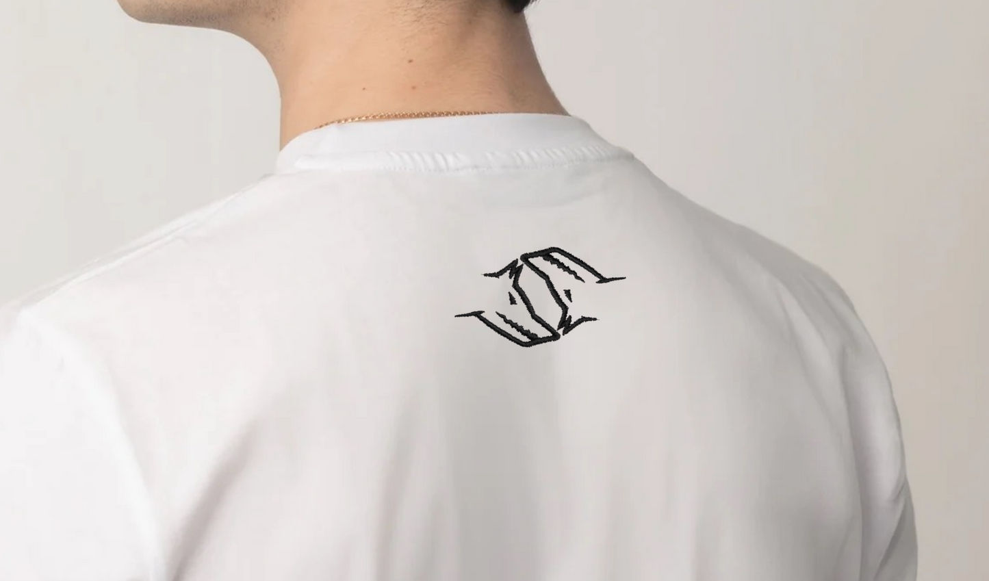 White shirt with a black Northwind Wolfinity logo on the back of the t-shirt