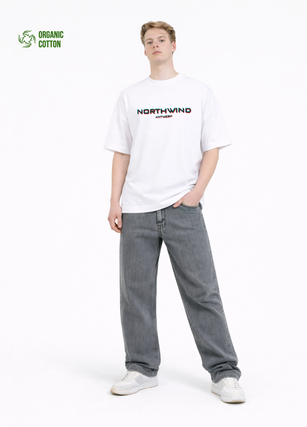 Person wearing a organic cotton oversized white t-shirt with glitch 'Northwind' logo and gray jeans on a white background