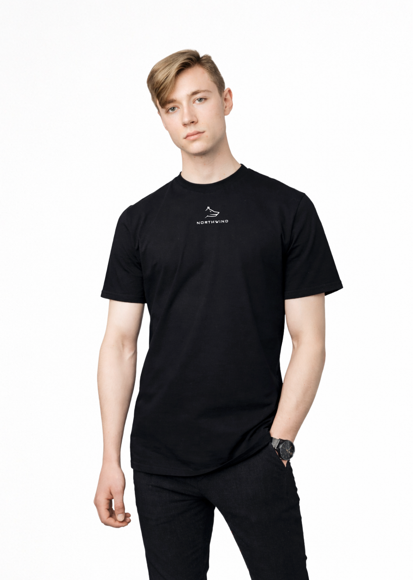 Blond man wearing a black Northwind casual t-shirt with minimalist Northwind embroidered wolf logo on the chest, black Casio watch