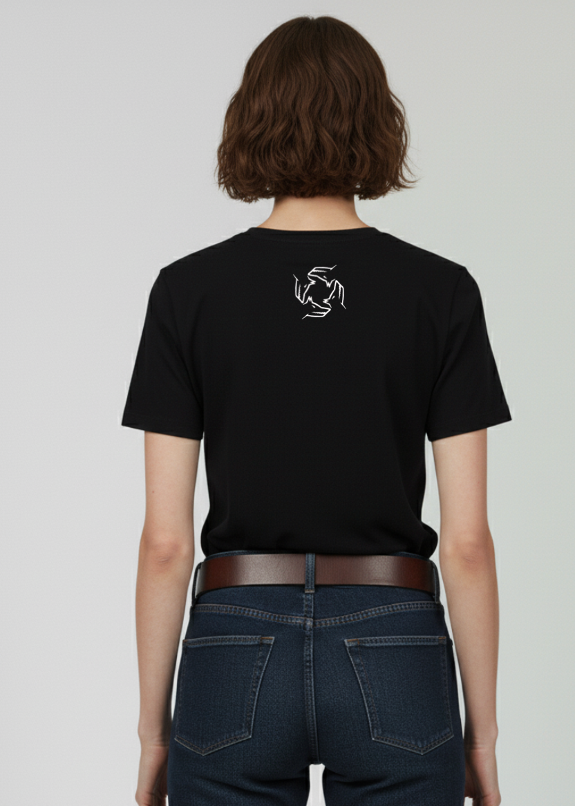 A woman wearing a Northwind Storm of Wolves Black T-shirt with Embroidery white logo on the back, standing against a plain background.