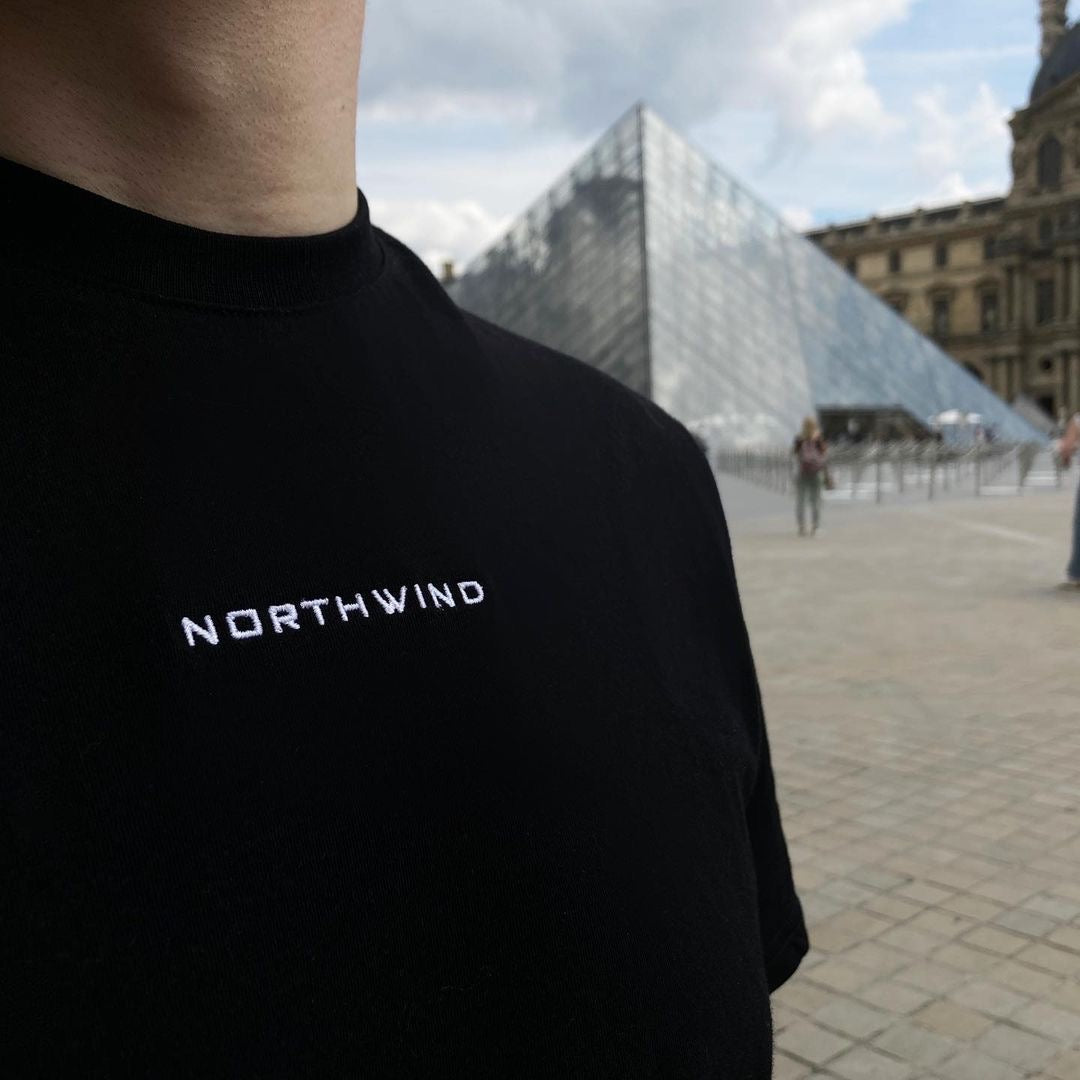 Paris Essential Black T-shirt by Northwind Antwerp and Paris with minimalist logo embroidery Louvre